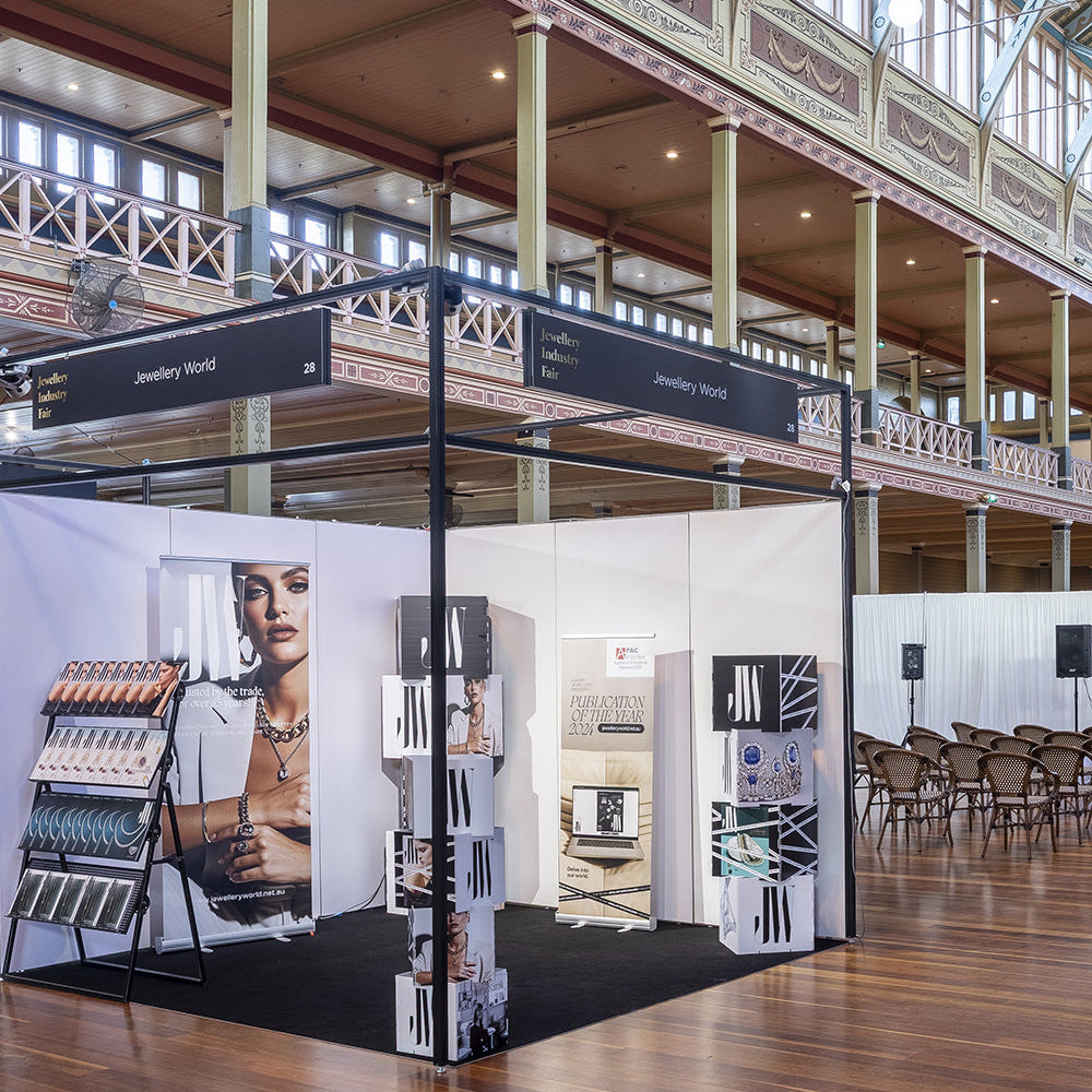 Exhibition stand with promotional materials in the Royal Exhibition Building