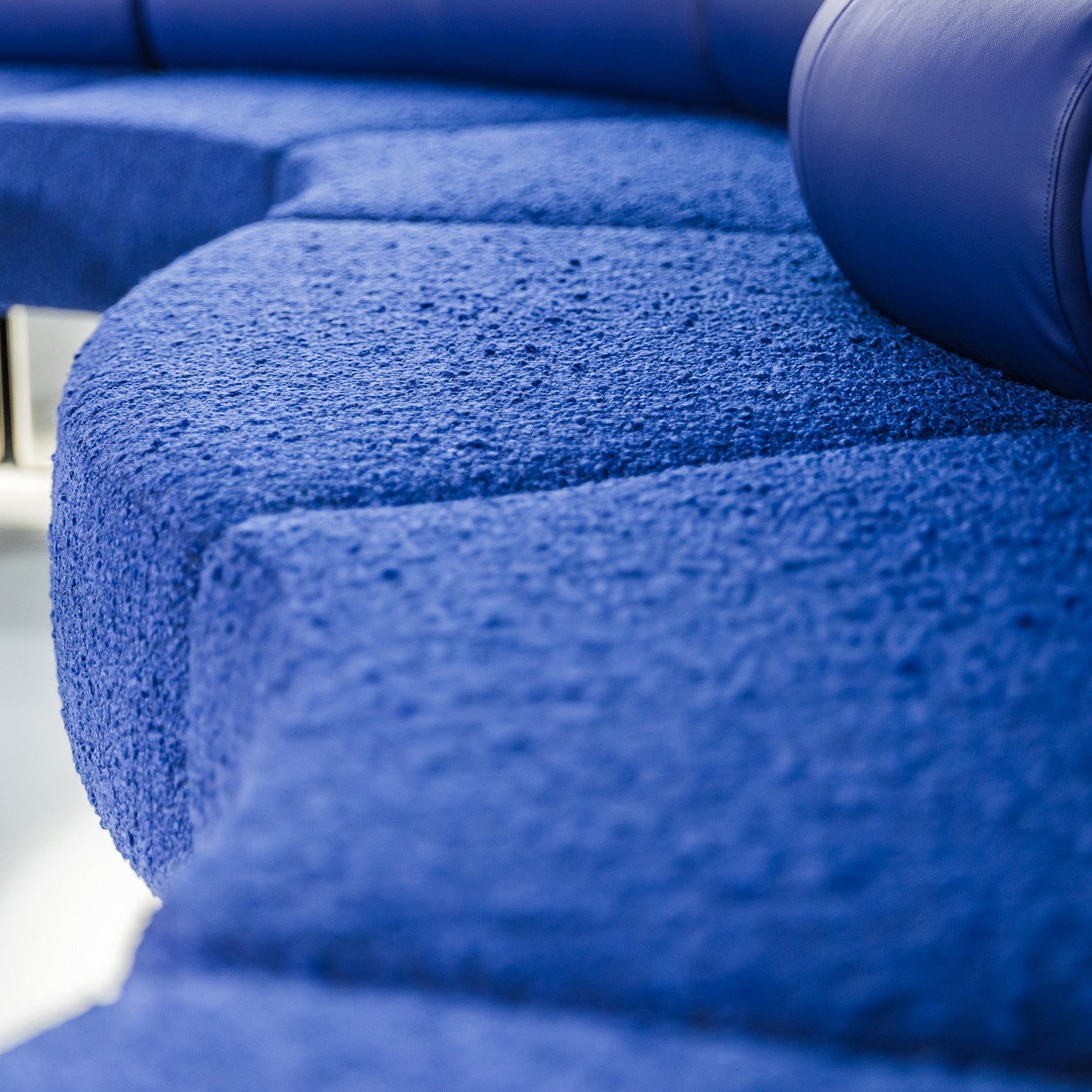 Close-up of a textured Zeon sofa with a blurred background