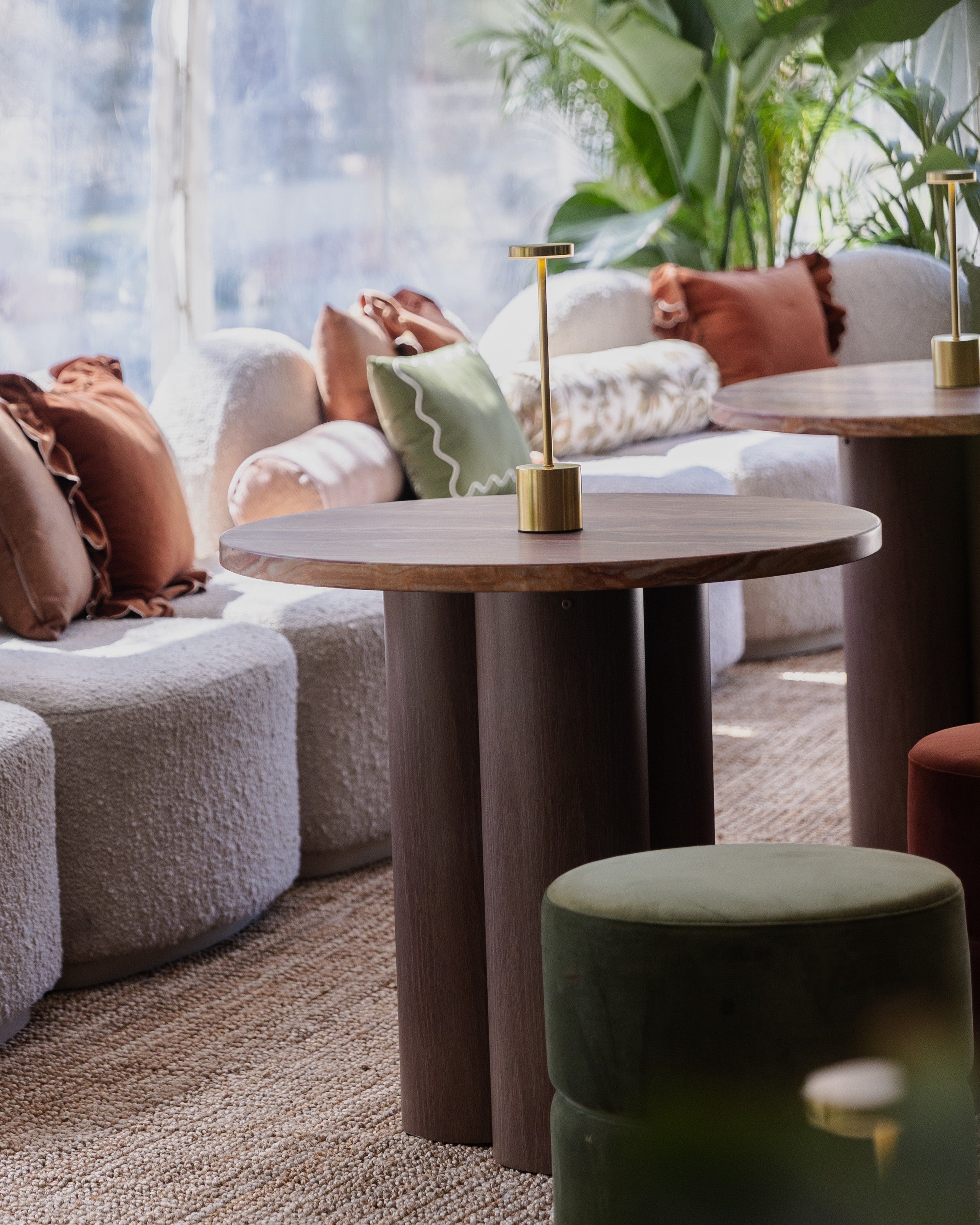 Marquee with a harper sofa, sienna coffee table and arden ottomans at an event