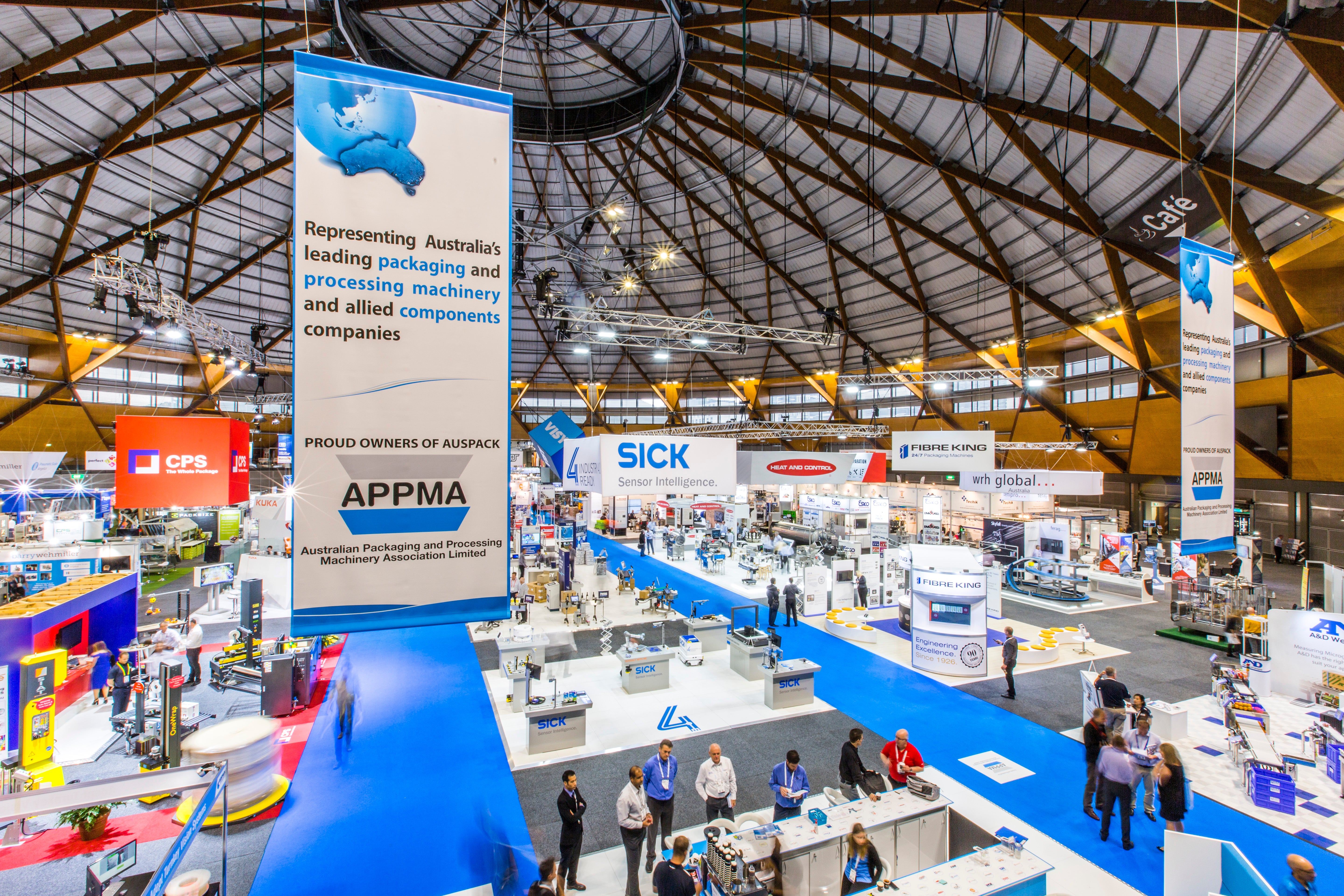 Large indoor exhibition hall with various booths and branding, featuring a prominent APPMA banner.