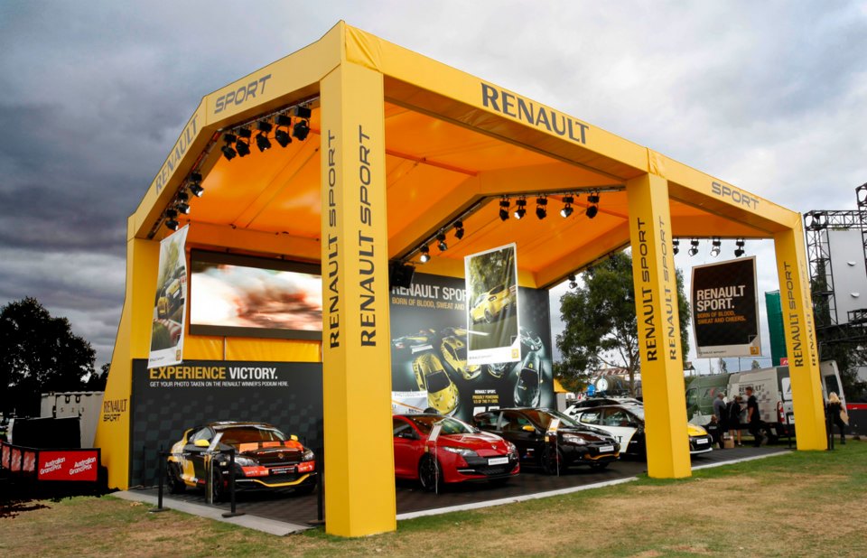 Renault Sport stall with cars on display at an outdoor event