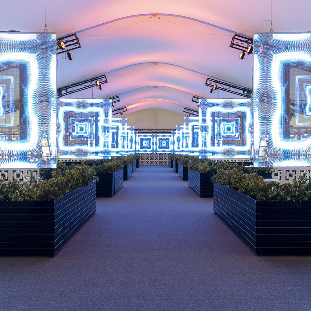Decorative marquee with illuminated transparent screens.