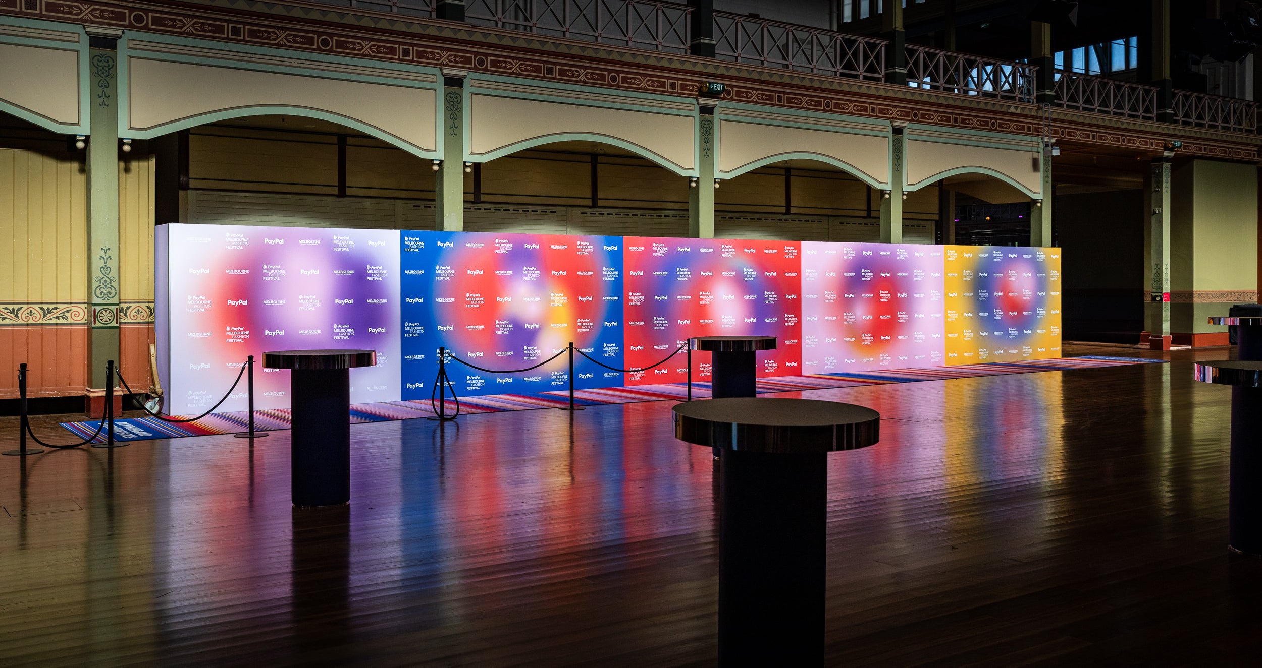 Corporate event signage hire — branded media wall and step-and-repeat backdrops for activations and conferences at Royal Exhibition Building Melbourne