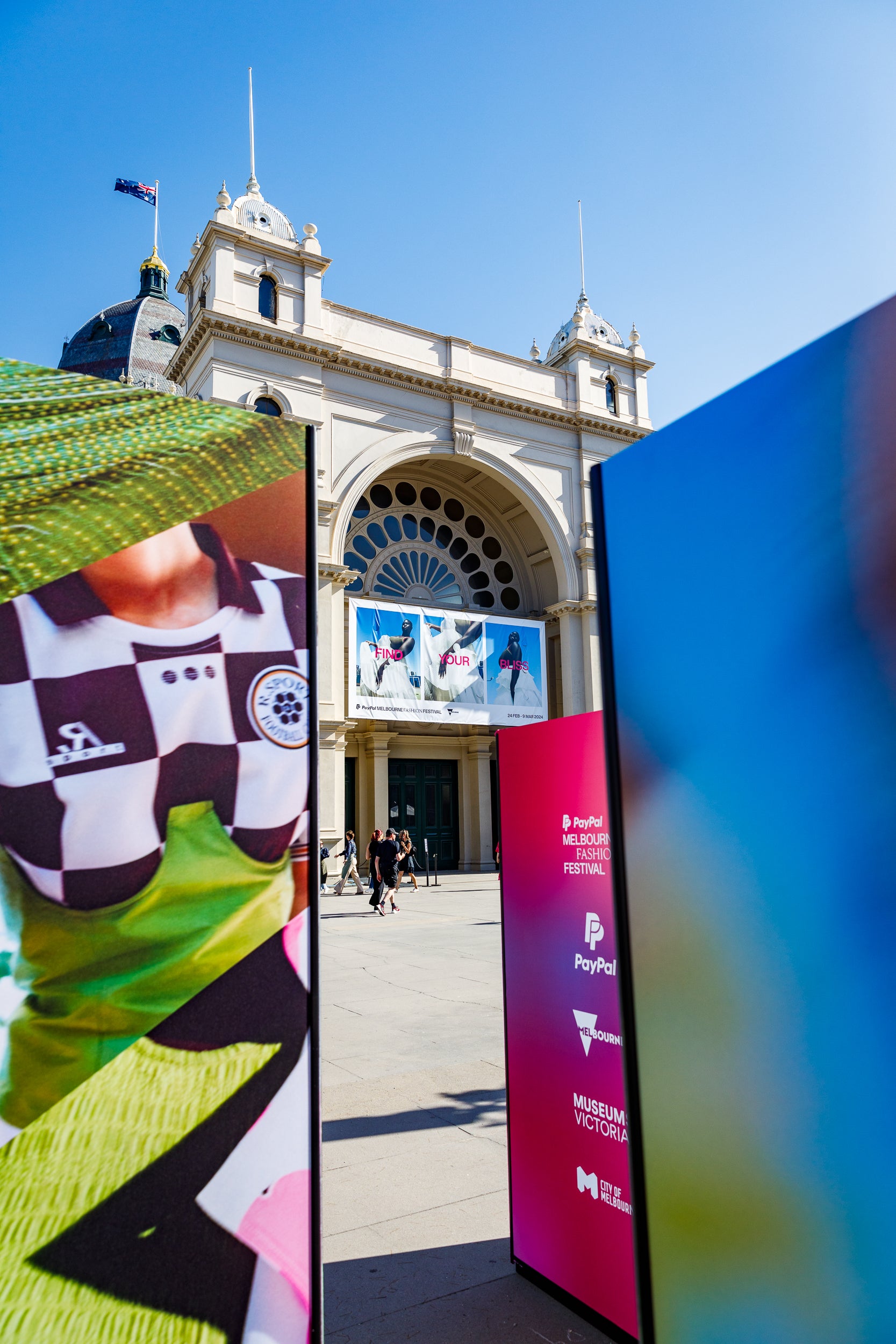 Entrance and wayfinding signage outside of the Royal Exhibition Building for Melbourne Fashion Festival