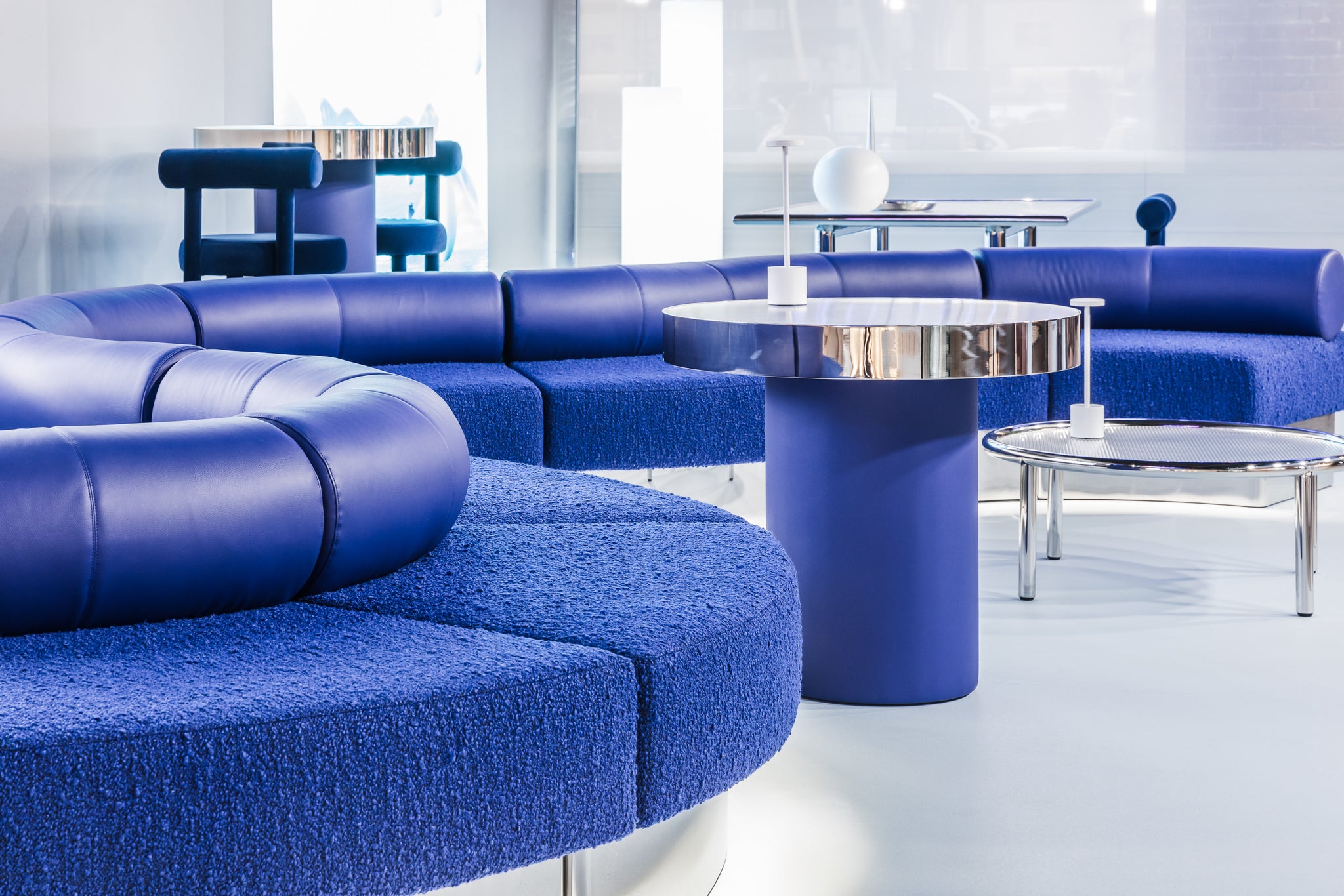 Zeon blue sofa set in the Melbourne Showroom with Helix and Zeon Tables