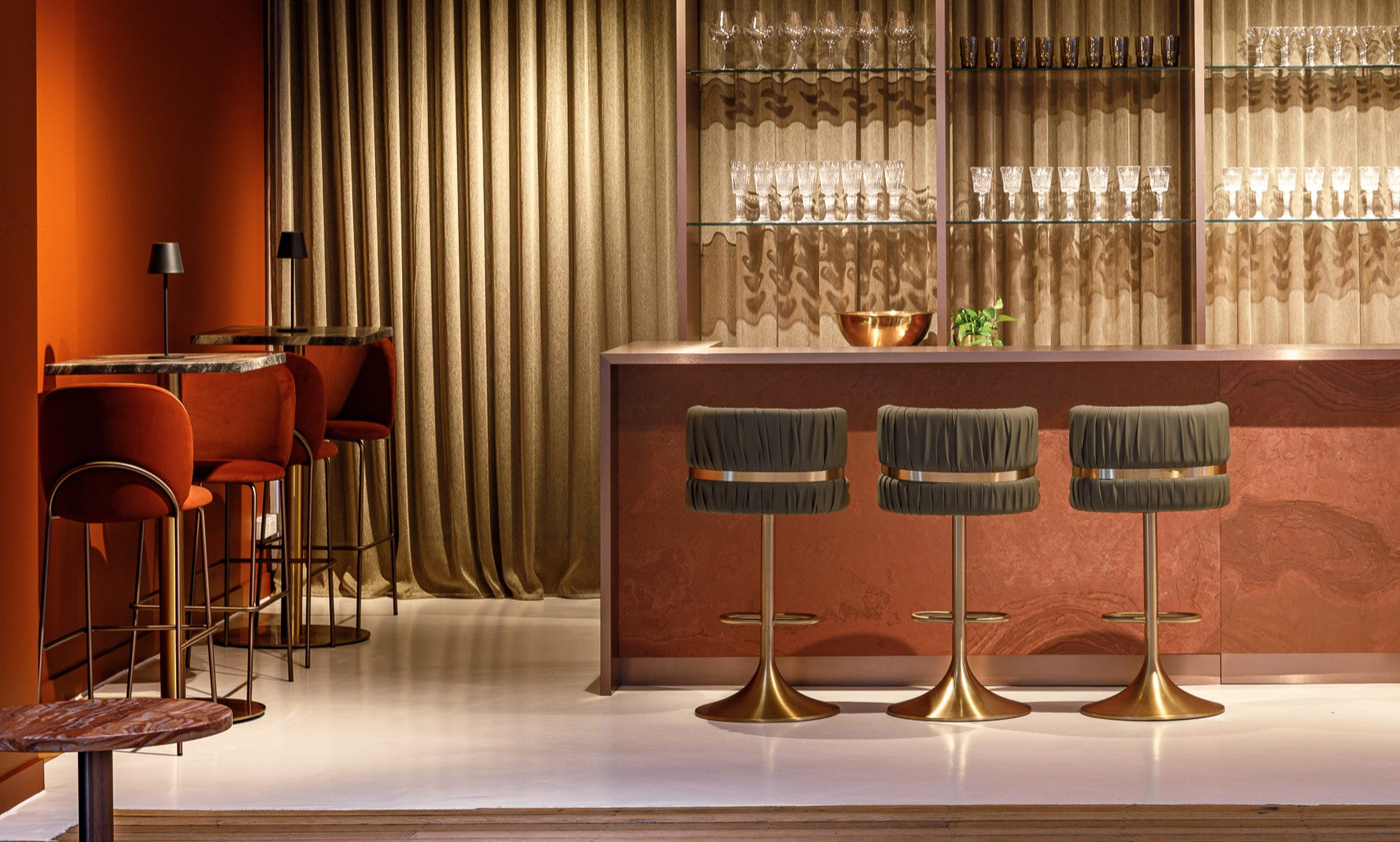 Modern bar interior with green Rocco Stools at our Melbourne Showroom