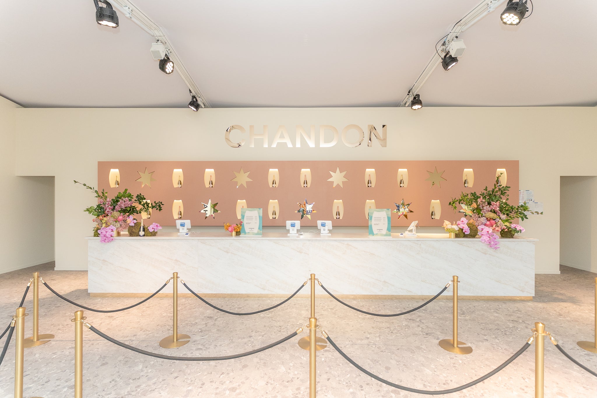 Chandon wine bar with decorative elements and lighting fixtures at Australian Grand Prix.