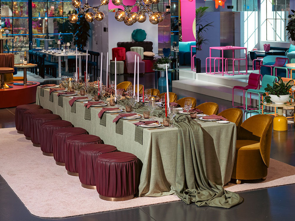 Long table set for a formal event with chairs and decorations in the Melbourne Showroom