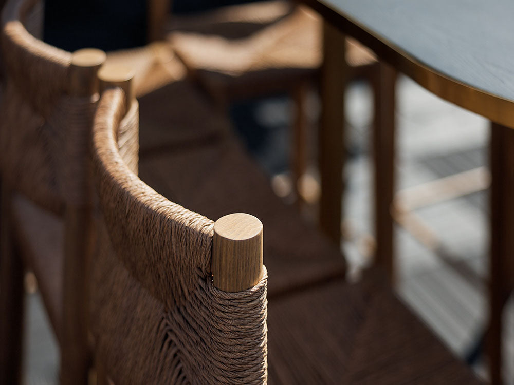 Close-up of a Casa wooden chair with a blurred background