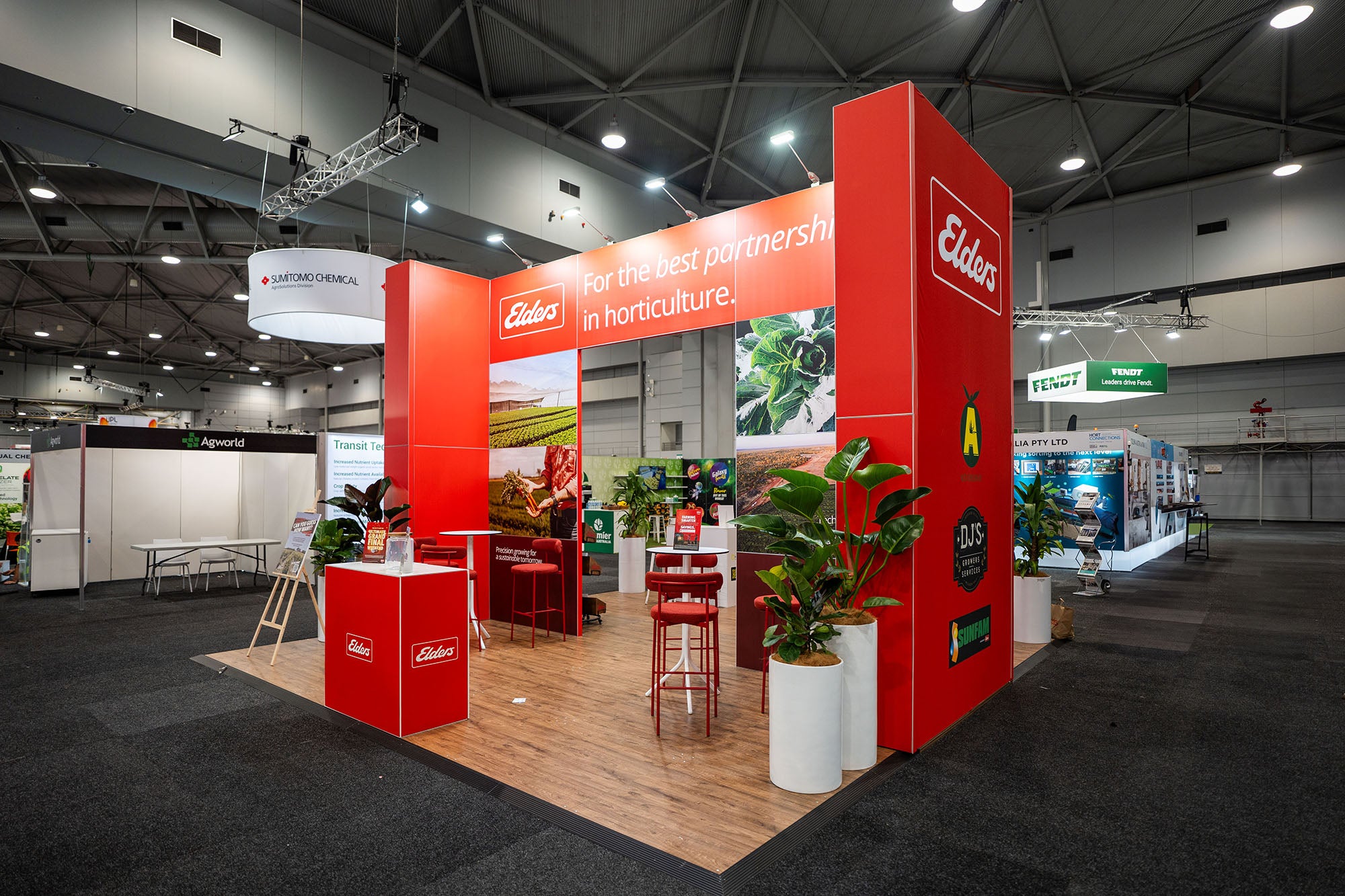 Red exhibition booth with 'Eilers' branding at a trade show.