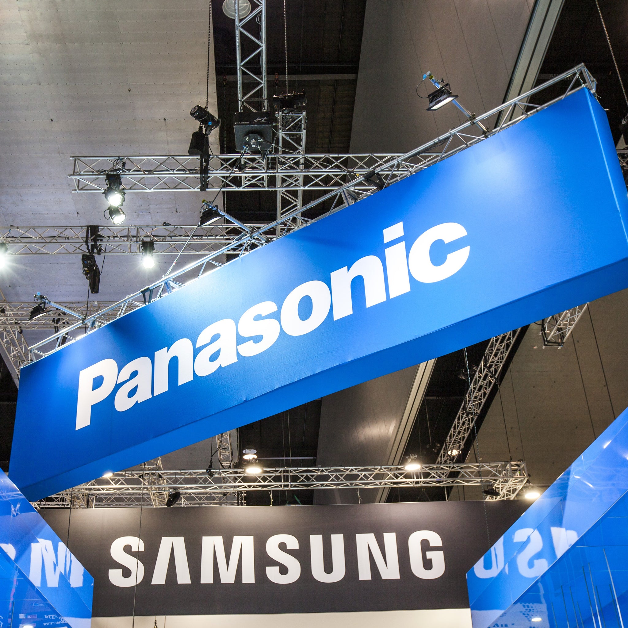 Panasonic logo on a blue background with Samsung logo below