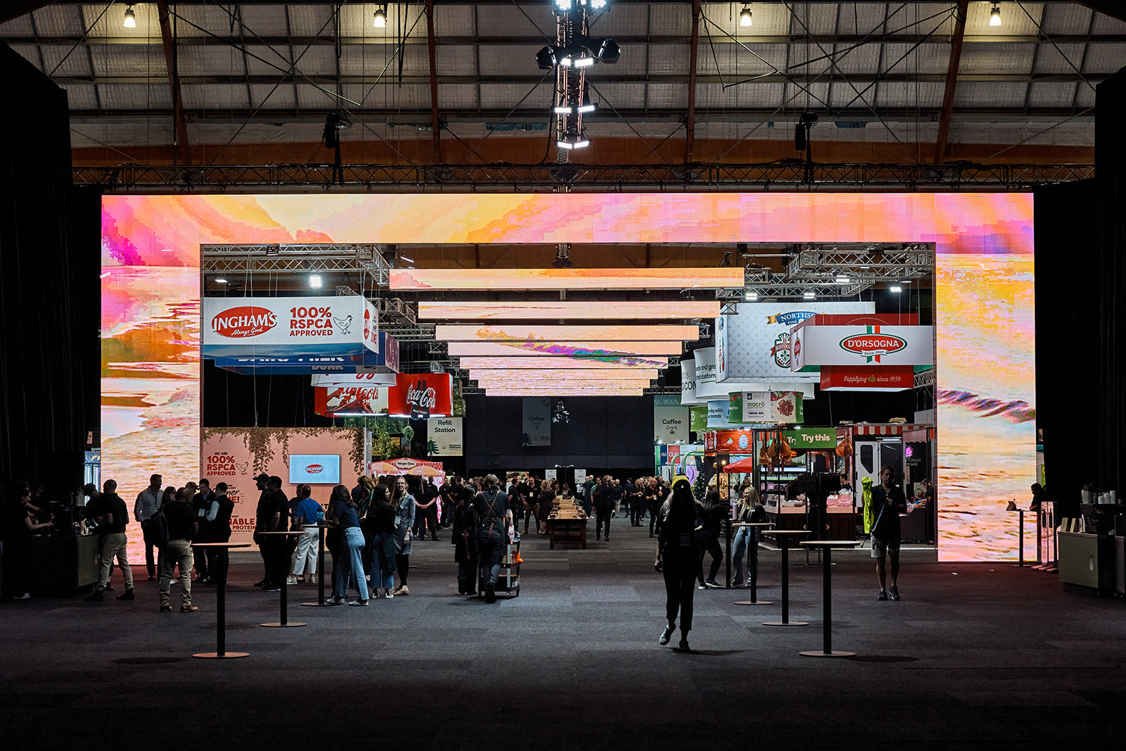 Large exhibition hall with productions rigged archways