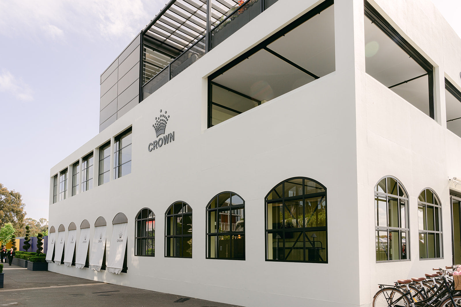 White marquee with 'Crown' logo at spring racing carnival