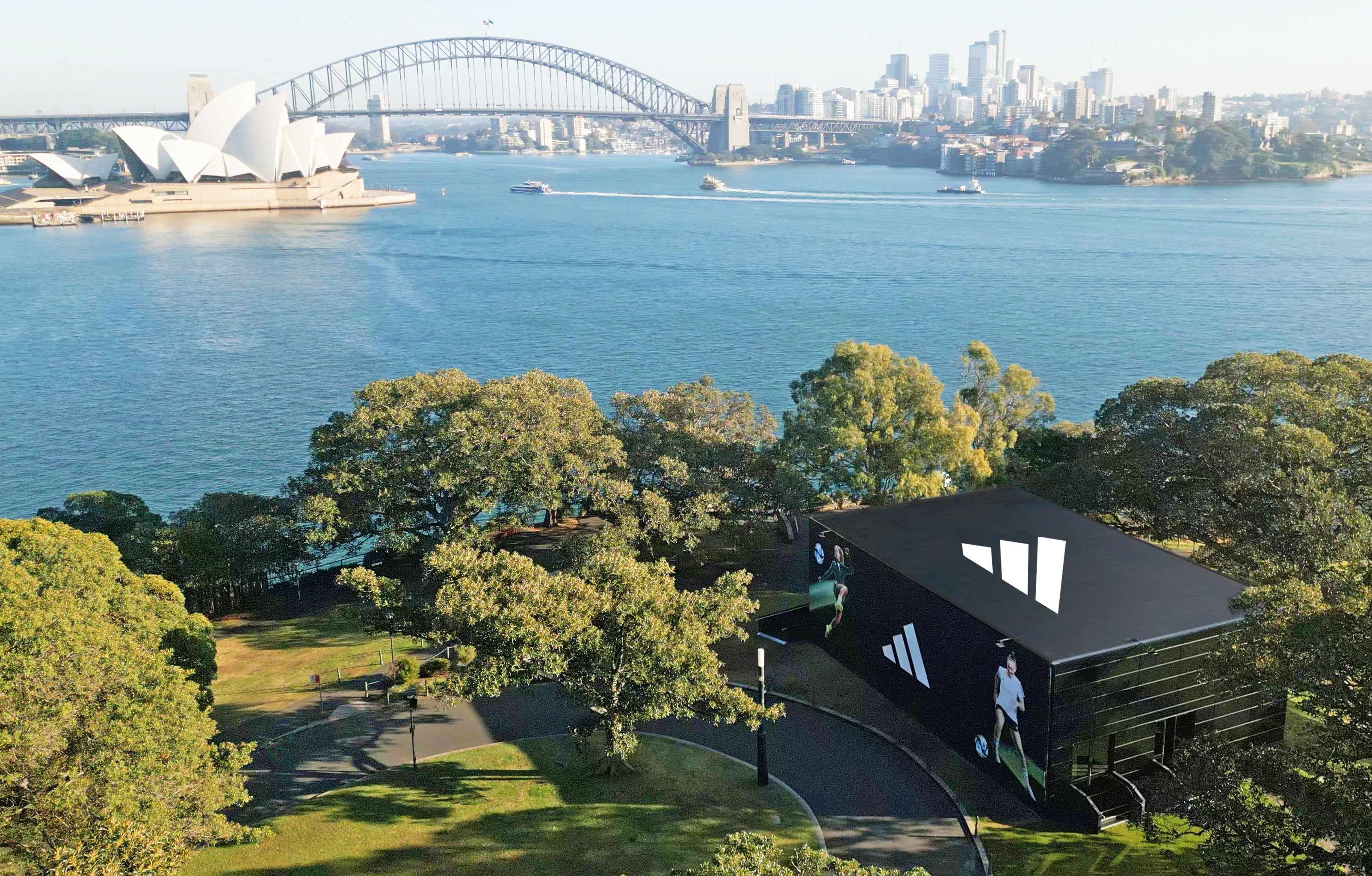 Sydney Harbour with the Sydney Opera House and Harbour Bridge in the background, featuring an Adidas marquee.